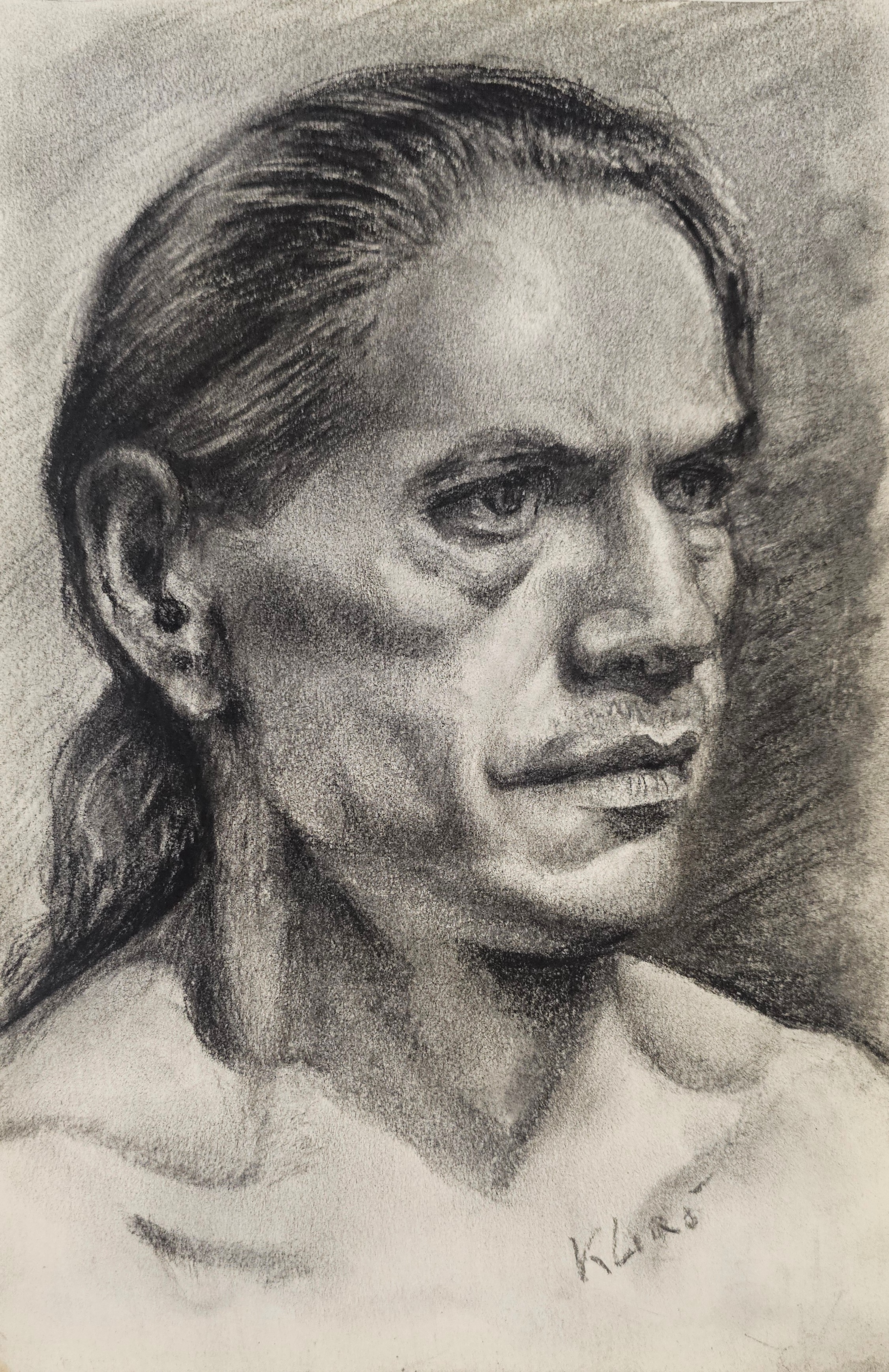 Disegno a carboncino di Klirò raffigurante volto di apache