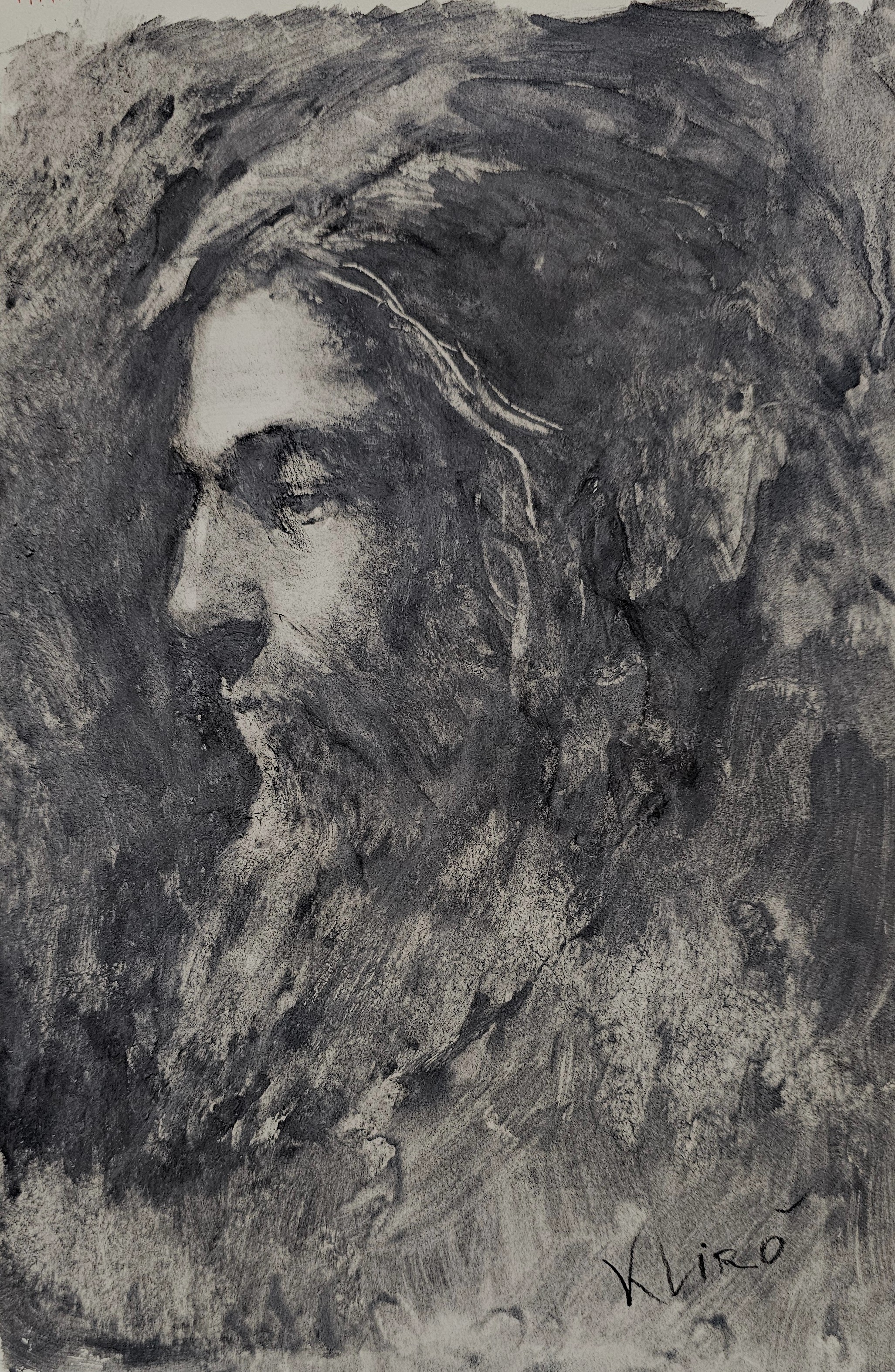 Disegno di profilo d'uomo eseguito da Klirò con carboncino nitram